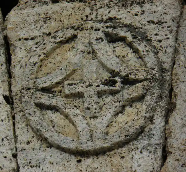 Cross inside a diamond-like symbol inside a circle on carved on a stone found in the ruins, Ephesus Izmir.